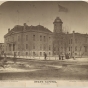 Black and white photograph of the first State Capitol building showing enlargement of 1878. Painted by Alfred Palmquist & Company, 1879.