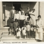 Black and white photograph of children on steps of Phyllis Wheatley House, ca. 1925.