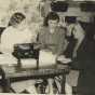 Black and white photograph of Crookston BPW members selling Artist Series tickets, 1954.