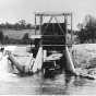 photograph of a steamboat going through a lock on the Pelican River