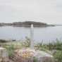 Color photograph of monument marking the northwest point of Lake of the Woods on Rose Island.