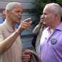 Color image of civil rights leader Julian Bond and Minnesota Governor Mark Dayton confering at a rally held to demonstrate opposition to Minnesota Marriage Amendment 1. Photographed by Bobak Ha’Eri on June 19, 2012.