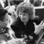 Black and white photograph of SPCO musician Carolyn Daws working with local music students, 1983.