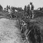 Black and white photograph of officers-in-training building a trench at Fort Snelling, 1917.