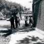 Police standing near a building on Plymouth Avenue in Near North Minneapolis during an episode of civil unrest in the neighborhood, ca. 1967. Photo by Twiggs.