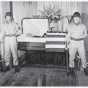 SFC Donald A. Anderson and M/Sgt. Leslie E. Kesti, both of Cloquet, members of Headquarters Battery, 257th Gun Battalion, Minnesota National Guard, serve as sentries of honor at the funeral of the late Albert Woolson (the last Grand Army of the Republic veteran) in a Duluth funeral home on August 4, 1956.