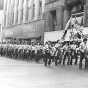 Black and white photograph of Brown Berets march in a Mexican Celebration Parade, St. Paul, September 15, 1972.