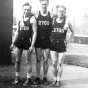 Black and white photograph of basketball players, Civilian Conservation Corps Company 2709, Whitewater State Park. Left to right: Joe Lewis, Frederick K. Johnson, and Carl Lund, 1935.