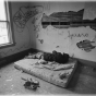 Person without housing sleeping in an abandoned building