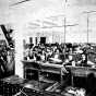 Black and white photograph of typesetters at West Publishing Company before the introduction of Linotype machines, 1885. 