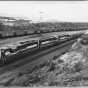 First Train of Taconite to Silver Bay, Minnesota, 1955. The first train of taconite from Reserve Mining Company’s Peter Mitchell Pit was shipped to the concentration facilities in Silver Bay in 1955.