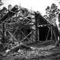 Black and white photograph of T. & S. Meyer of Park Rapids building Douglas Lodge, 1904.