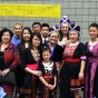 Color image of participants in the Operation Free Flu Shot program gather for a group photograph at Hmong Village in St. Paul on October 27, 2013. 