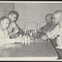 Golden Agers playing chess at Hallie Q. Brown House