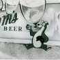 Still image of a Hamm's TV commercial showing the Hamm's bear playing baseball, early 1950s.