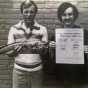 Ken Bresley (holding the eelpout) and Don Overcash, the founders of the International Eelpout Festival, promoting the first festival, 1980. Photo by Don Smith, Walker Pilot-Independent. Used with permission.