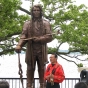 Ojibwe spiritual Leader Larry Aitken with Shaynowishkung statue