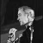 Black and white photograph of Senator Eugene McCarthy speaking at St. John's University, 1968.