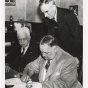 Senator Harry Wing signing a complaint