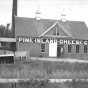 Black and white photograph of Pine Island Cheese Co., 1937. 