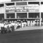 Photograph of Municipal Stadium, the home of the St. Cloud Rox from 1948-1970, showing the exterior of the stadium and a line of people waiting to get into the game, c.1950. From the Myron Hall Collection, Stearns History Museum and Research Center, St. Cloud.