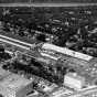 Black and white aerial photograph of Weyerhaeuser Twin City yard and surrounding area, 2563 Franklin Avenue, St. Paul, 1953.