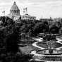 Tinted photographic postcard on paper. Its view faces northwest across Central Park toward the (then new) State Capitol, c.1915.