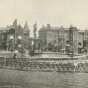 Black and white photograph of Central Park Place East, with the James Humphrey House and the Gustave Schurmeier rowhouses, c.1900.