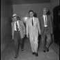 James P. Taylor (center) in police custody on July 5, 1956, the day he was sentenced to life in prison without parole for the murder of Kenneth Lindberg. Box 423 of the Minneapolis Star Tribune negatives collection, Minnesota Historical Society, St. Paul.