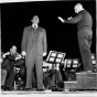 Dimitri Mitropoulos conducting a vocal soloist