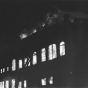 Flames from the 1987 Opera House Block fire light up the night and smoke is seen up to ten miles away.