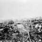 Black and white photograph of Duluth & Northeastern Railroad yards after the fire, 1918.