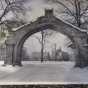 Black and white photograph of Shattuck School, Faribault, c.1949. The arch and Shumway, designed in 1886, and Morgan Refectory designed in 1888. 