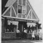 Black and white photograph of the exterior of Stickney’s grocery store, ca. 1930s.