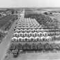 Black and white photograph of tents and "hutments" at Camp Ripley, 1965.