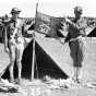 Black and white photograph of Moe Jones and Einar Lund of Stillwater’s Howitzer Company, 135th Infantry, during a field inspection at Camp Ripley, 1935. 