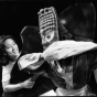 Color image of Shaman (Jennifer Weir) and Chwibari Dancer (Kaori Kenmatsu) in the Mu Performing Arts production of <em>Walleye Kid</em>, written by R. A. Shiomi and Sundraya Kase, directed by Rick Shiomi, 1998. Photographed by Charissa Uemara.