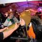 Kissing an eelpout for luck at the International Eelpout Festival, Walker, 2013. Photo by Josh Stokes. 