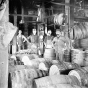 Black and white photograph of M. A. Company workers constructing vinegar barrels, c.1912.