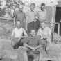 Black and white photograph of Adolf Dehn (standing at right) while serving time in the guard house of an army camp, Spartanburg, South Carolina, 1918.