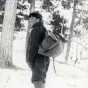 Photograph of Frank Higgins, a lumberjack sky pilot, outdoors c.1900.