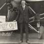 Black and white photograph of Charles Augustus Lindbergh with his plane, c.1927.