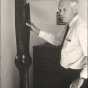 Black and white photograph of Charles Augustus Lindbergh with a plane propeller, c.1971.