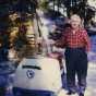 Color image of Dorothy Molter with her Polaris Mustang snowmobile, Isle of Pines, Knife Lake, Boundary Waters Canoe Area, ca. 1970s.