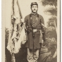 Color-bearer holding tattered First Minnesota flag after Gettysburg