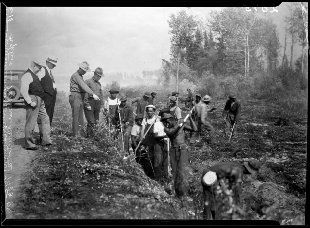 Black and white photograph of African American Civilian Conservation Corps fire fighters, northern Minnesota, ca. 1933. Photographed by the St. Paul Dispatch.