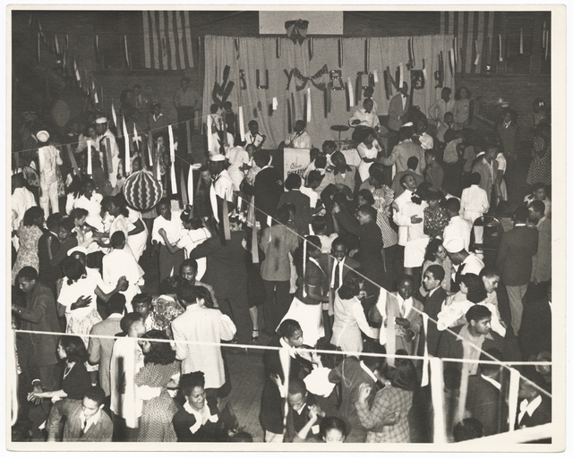 Black and white photograph of a neighborhood dance at Phyllis Wheatley House, ca. 1945.