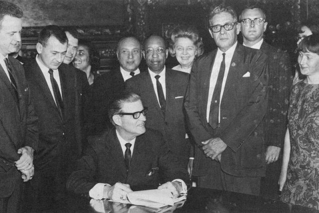 Governor Harold Levander Signs The Minnesota State Act Against ...