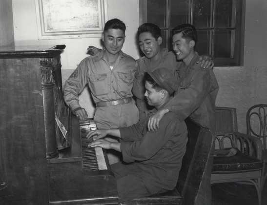 Black and white photograph of Japanese American soldiers at Fort Snelling, VJ Day, 1945. 