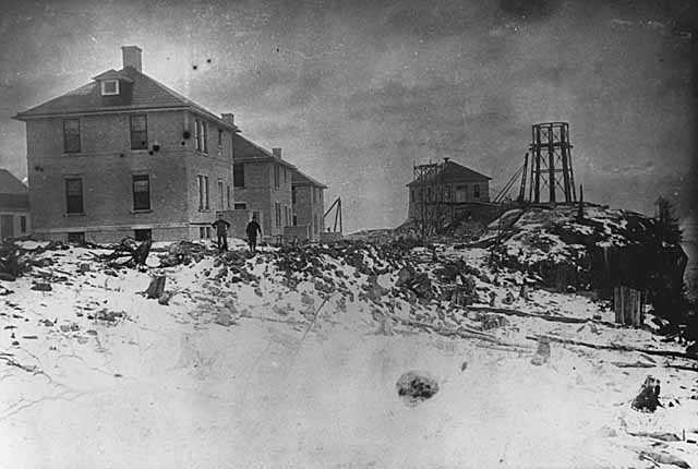 Black and white photograph of Split Rock Lighthouse being built c.1909.